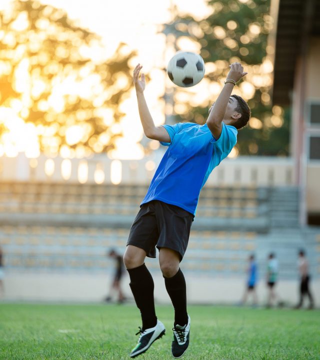 Soccer player action on the stadium
